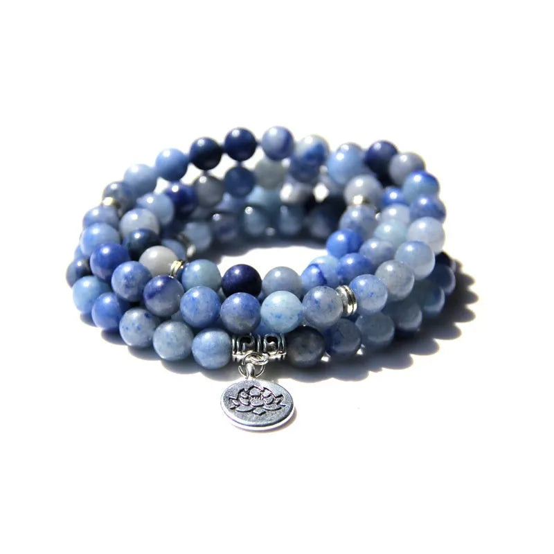 A vintage-style women's bracelet made from natural stone with a geometric lotus design.