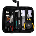 Black plastic guitar repair tool kit case open to show metal and plastic tools for guitar, bass, mandolin, banjo.