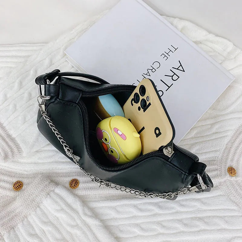 Butterfly chain underarm bag in horizontal square shape with detachable strap and organised interior