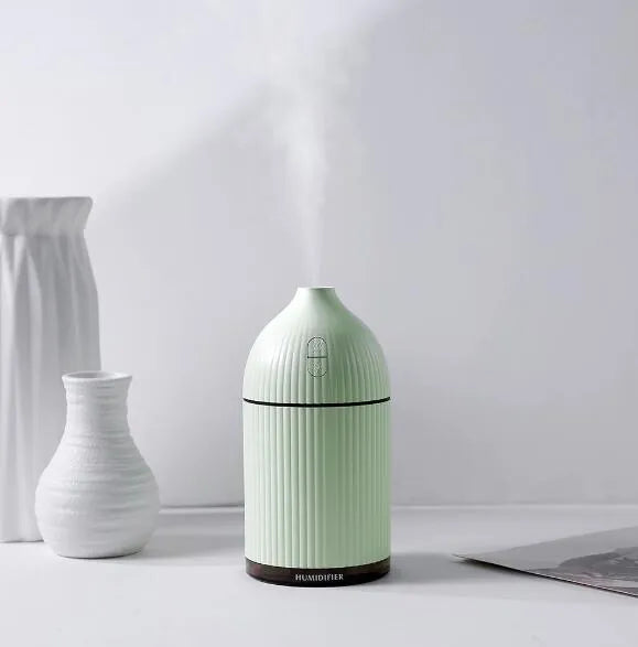 White 300ml ultrasonic aromatherapy diffuser with LED lights and USB cable