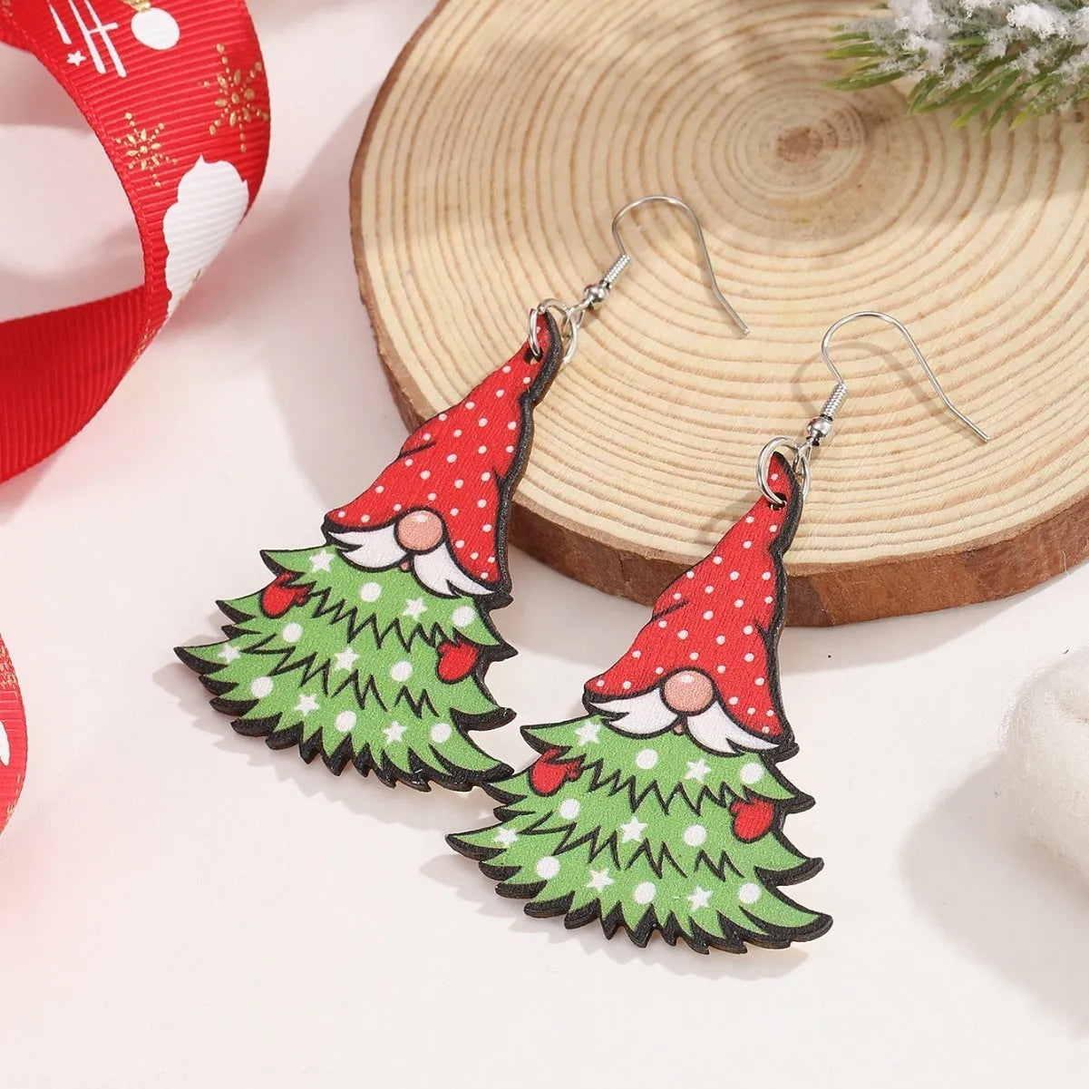 Women's geometric wooden Christmas earrings with printed tree and snowman designs