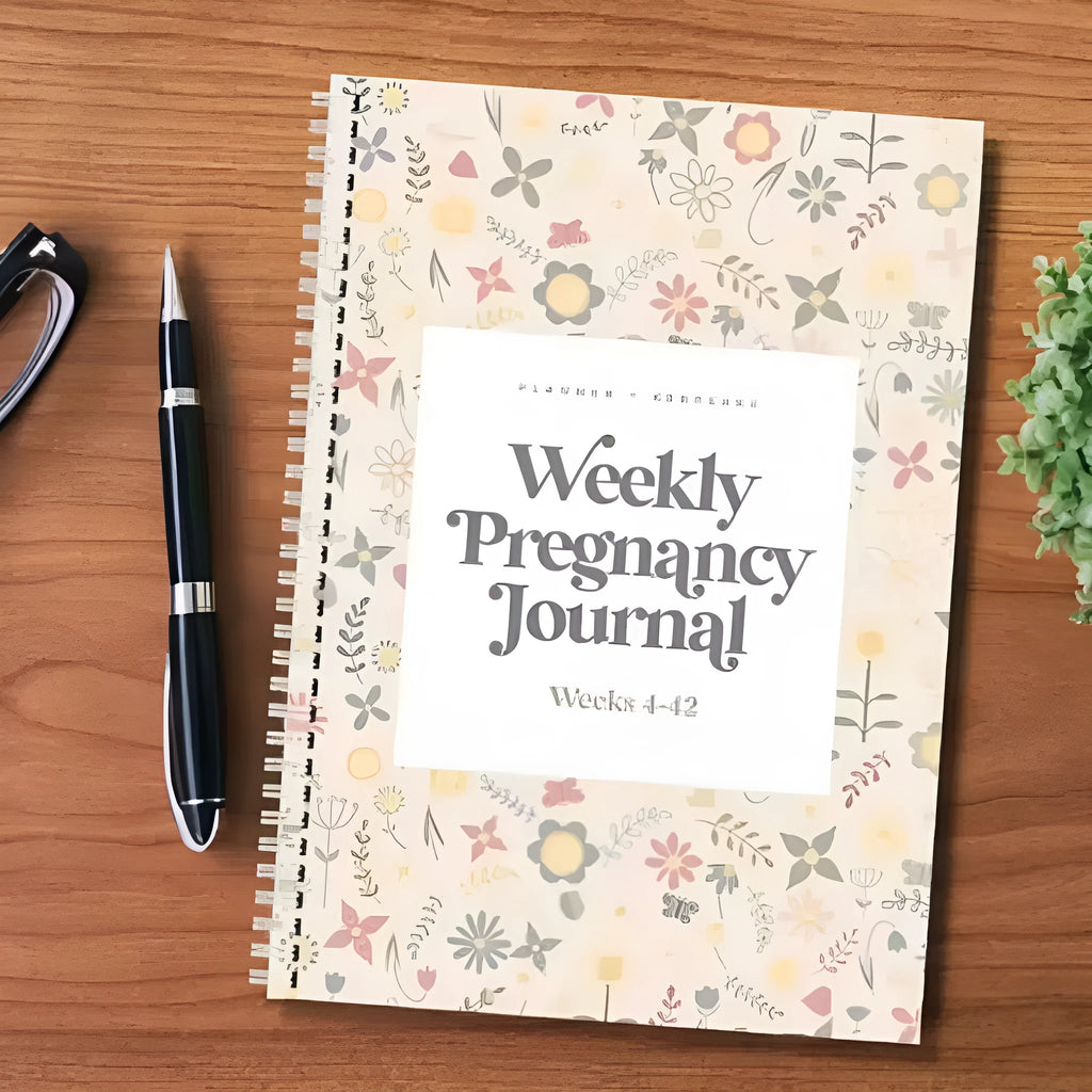 A5 weekly pregnancy diary notebook open to weekly tracking pages