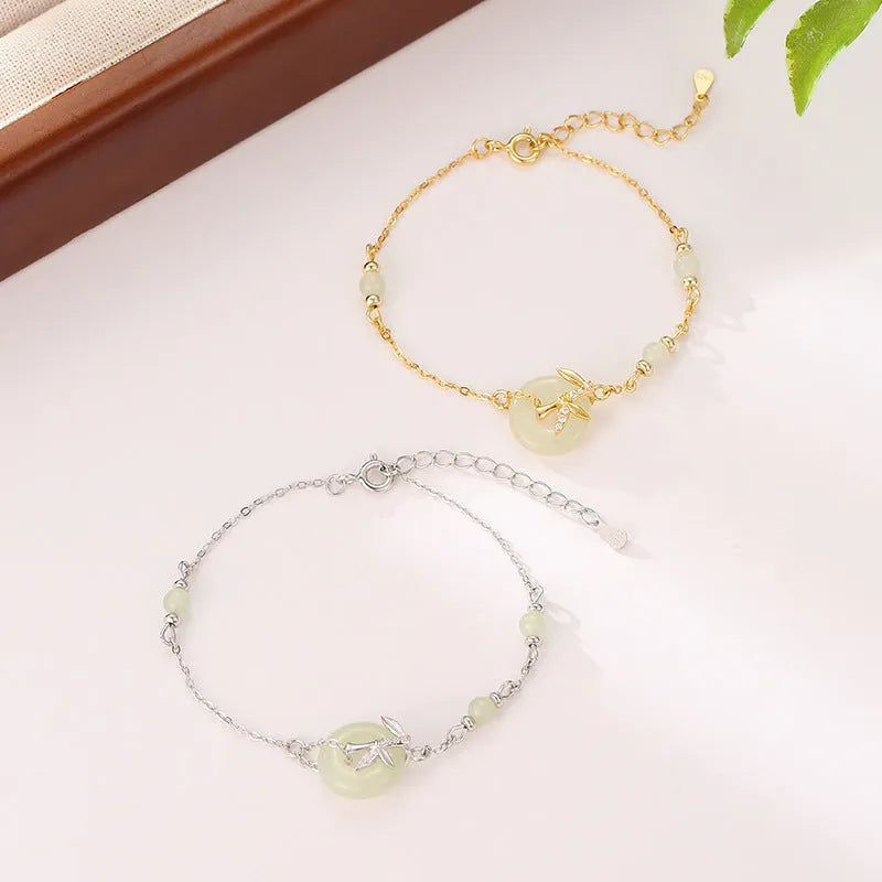 Women's Hetian Jade safety buckle bracelet in antique style with peace buckle detail