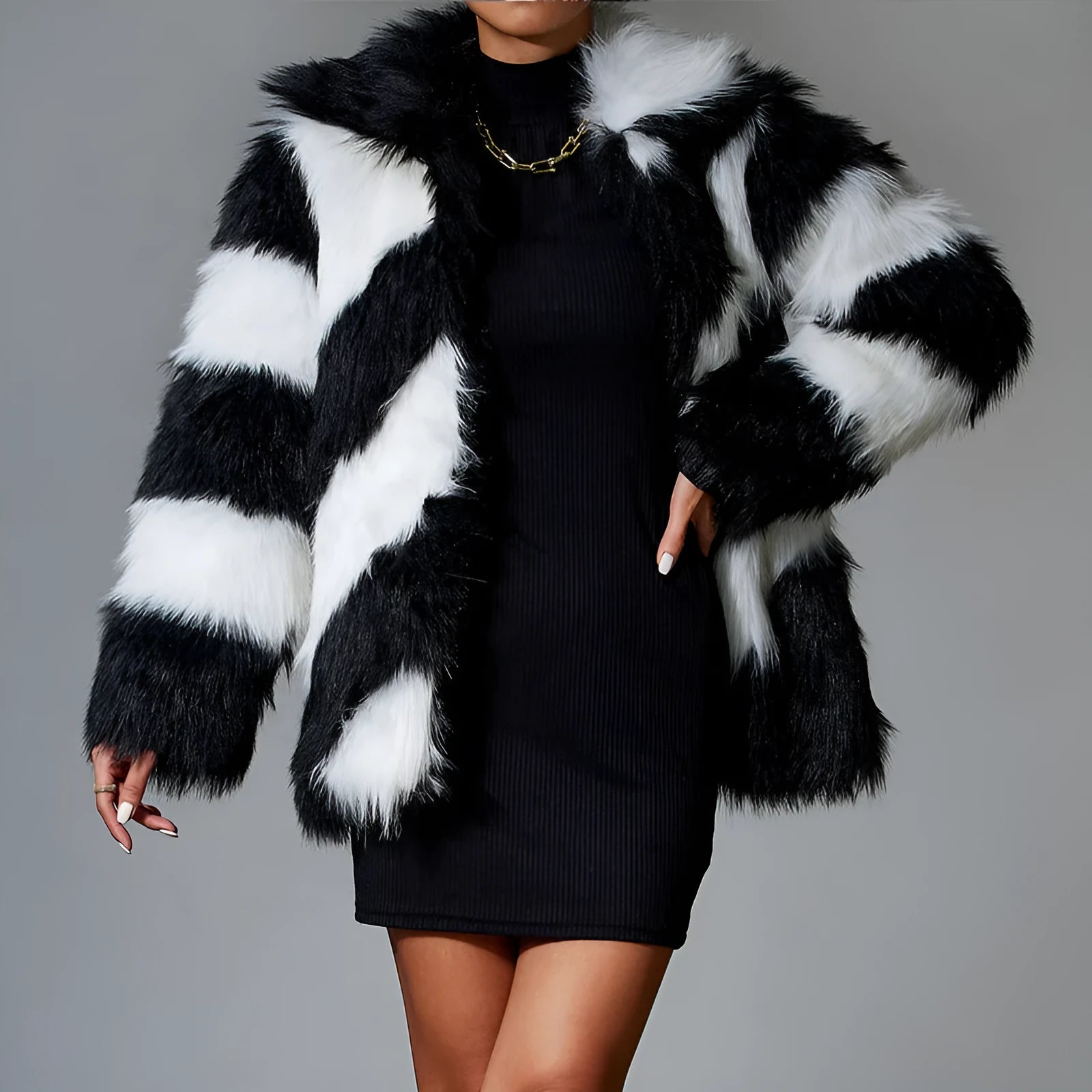 Picture Colour faux fur coat with dark contrast lapels and a matching fur collar.