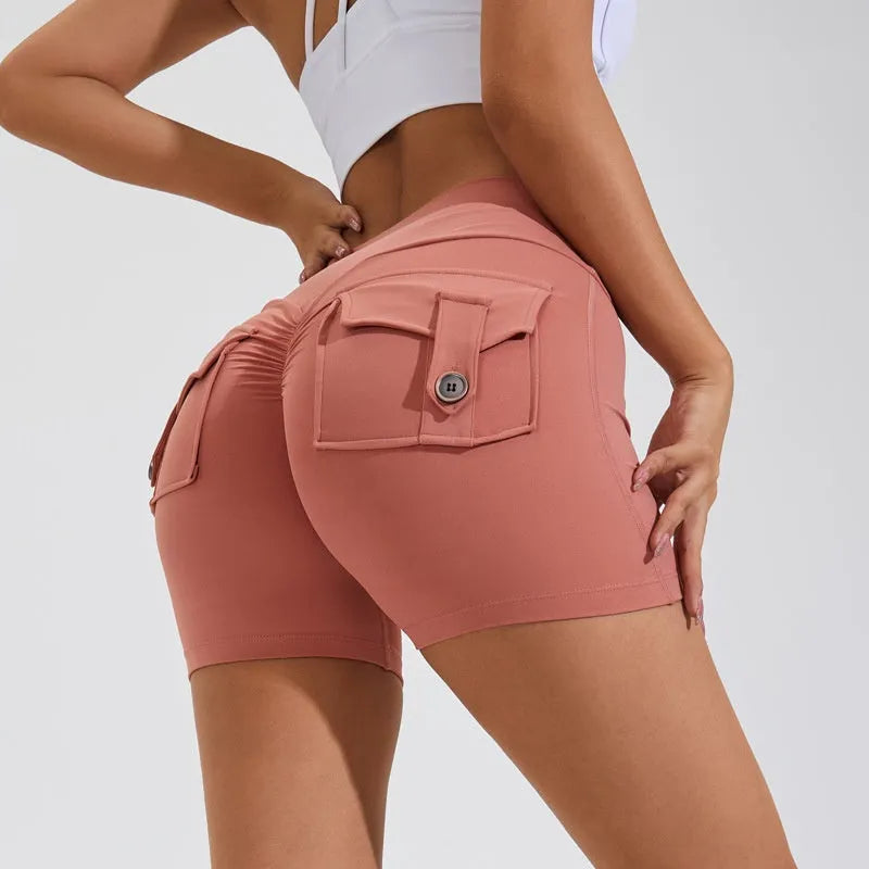 Women's high waist hip lifting shorts with pockets in various colours for fitness activities