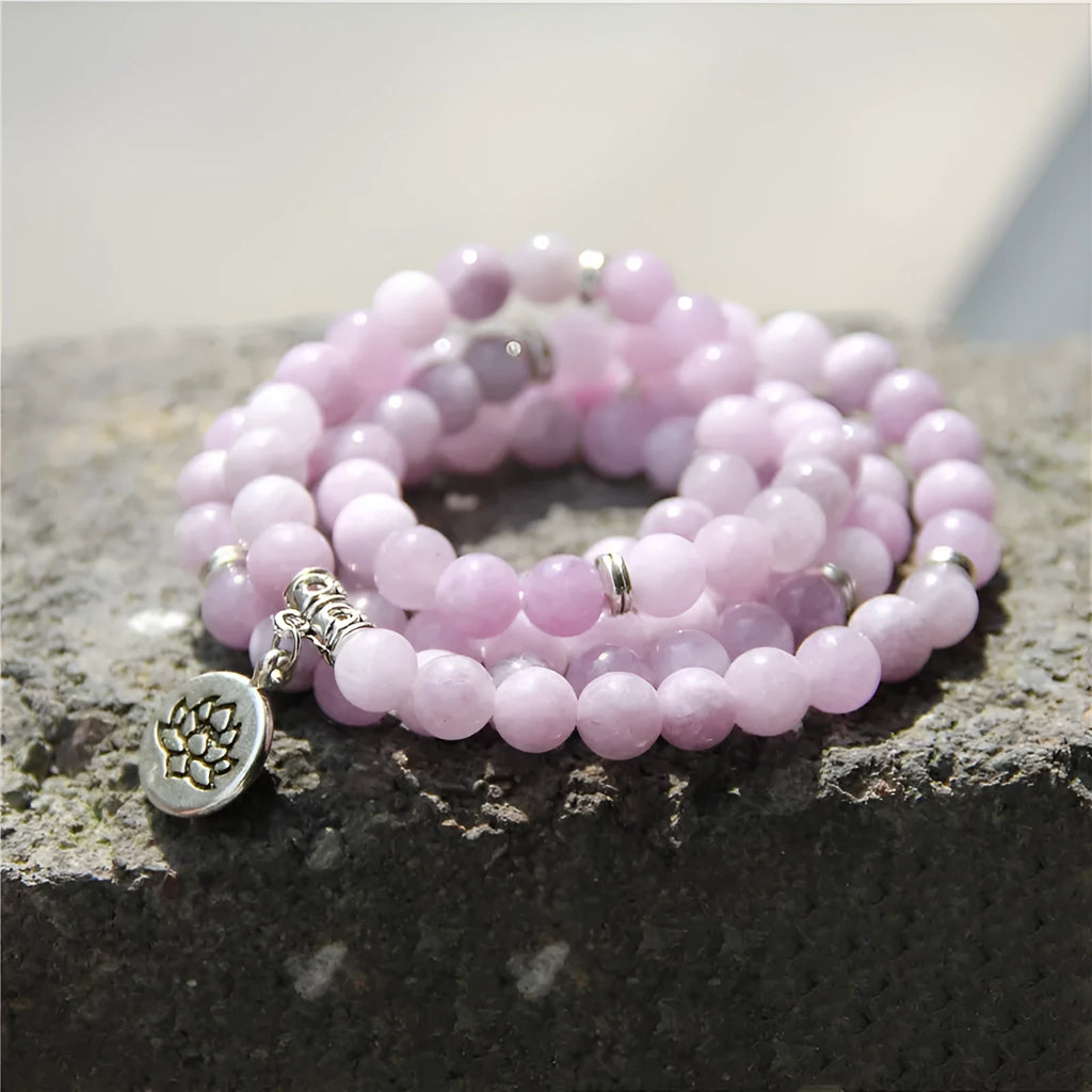 A vintage-style women's bracelet made from natural stone with a geometric lotus design.