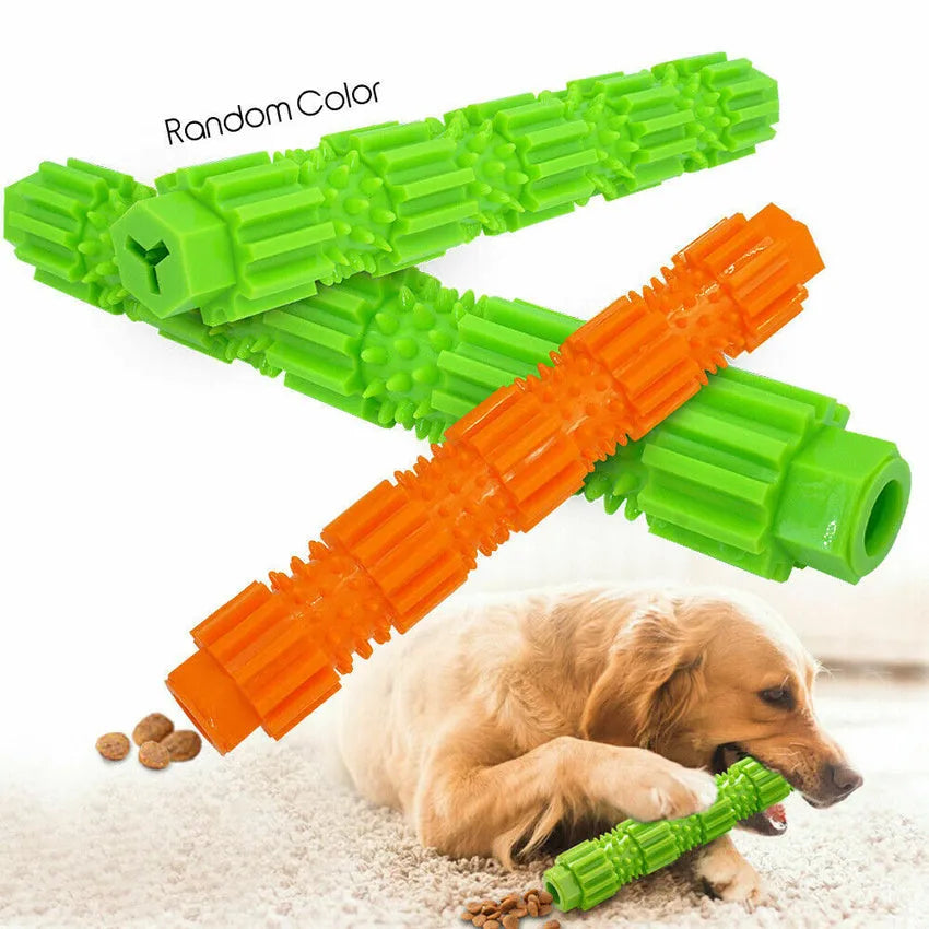 Green and orange bone-shaped rubber dog chew toy for aggressive chewers with treat hole and textured surface.
