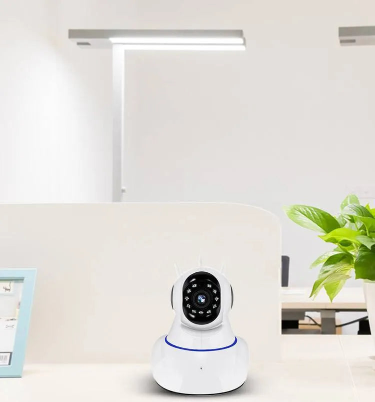 White dome-shaped wireless security camera with 2MP HD resolution and night vision for indoor/outdoor use