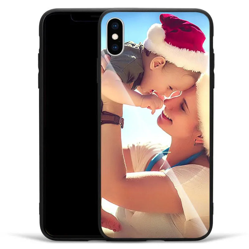 Slim patterned iPhone case with raised edges protecting a smartphone.