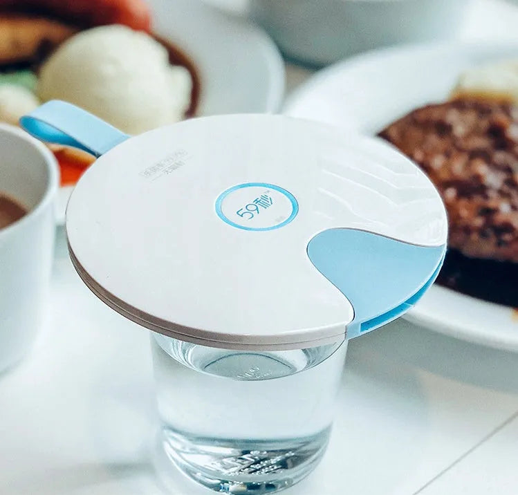 Portable UV baby bottle steriliser in blue colour showing compact design with USB charging port