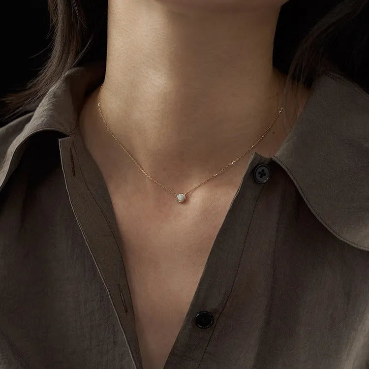 S925 sterling silver geometric pendant with jelly opal, shown in gold and white gold plating options.
