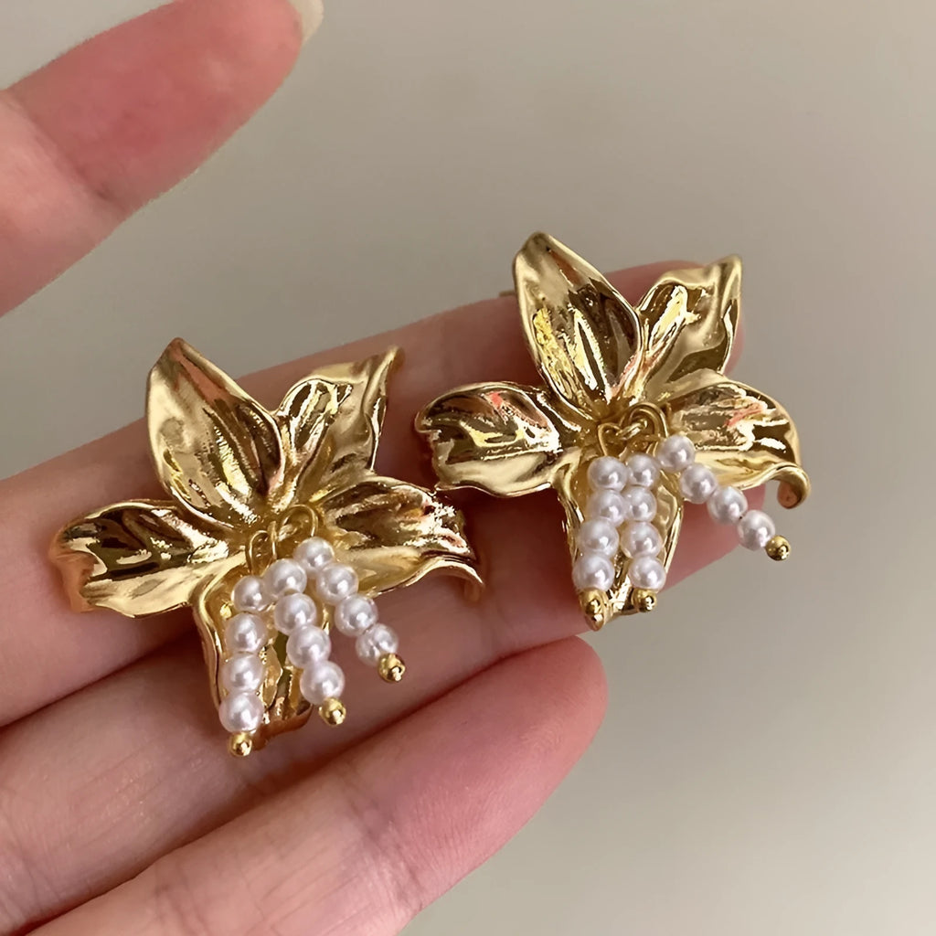 Golden H1795 pearl flower earrings with Seiko-treated metal and floral design