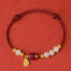 Women's adjustable bracelet with Hetian jade, cinnabar and red rope on 925 silver chain