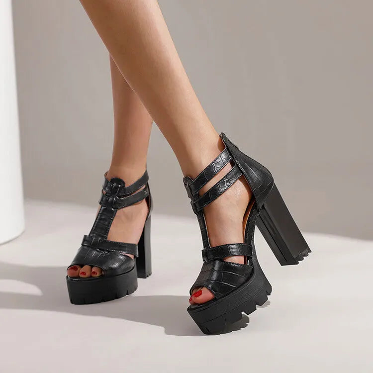 Women's black platform high heel sandals with a back zipper and round toe on a rubber sole.