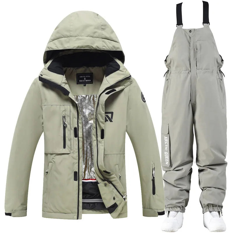 Blue and black unisex winter ski suit jacket and pants for snow sports.