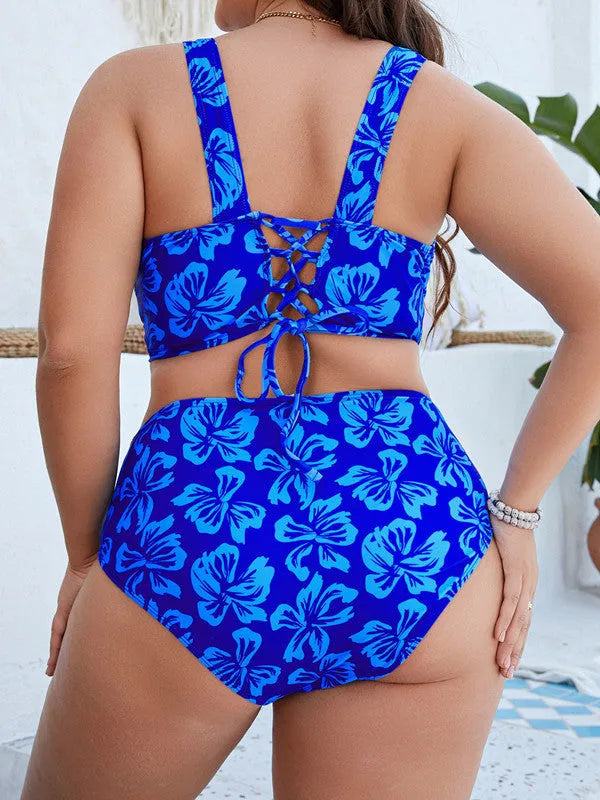 Blue floral split bikini swimsuit for women in polyester fabric showing 0XL to 4XL sizing options for beach and swimming.