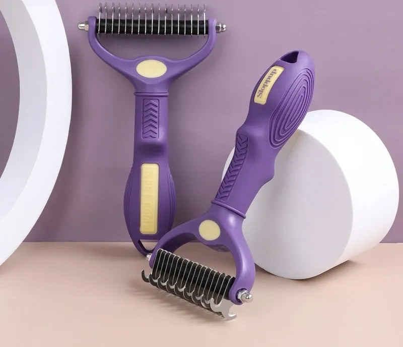 Purple plastic double-sided pet comb for removing knots from dog or cat fur.