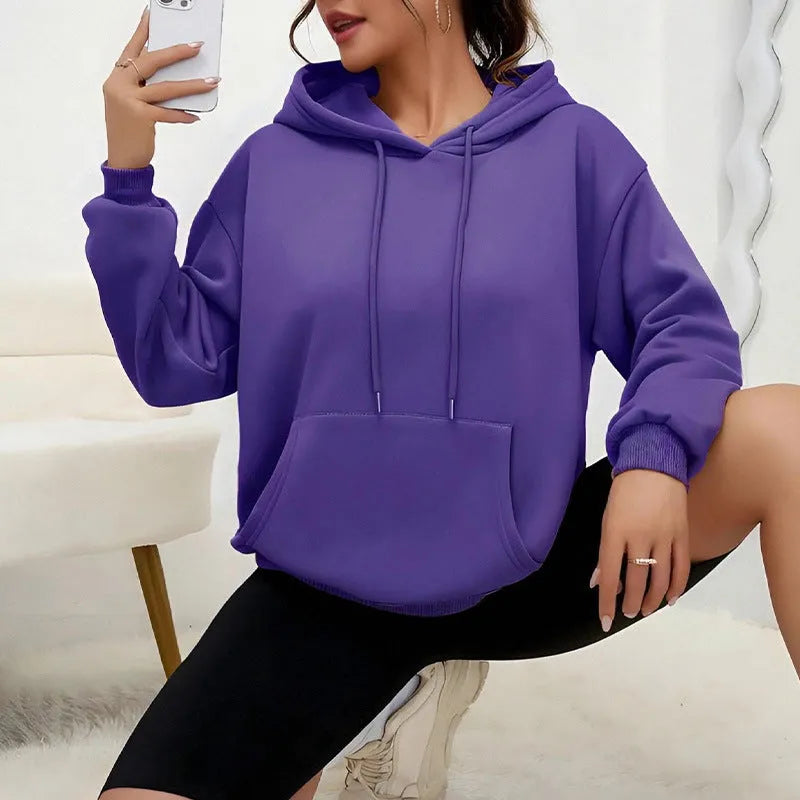 Women's loose fit long sleeve sweatshirt with drawstring and front pocket in multiple colour options