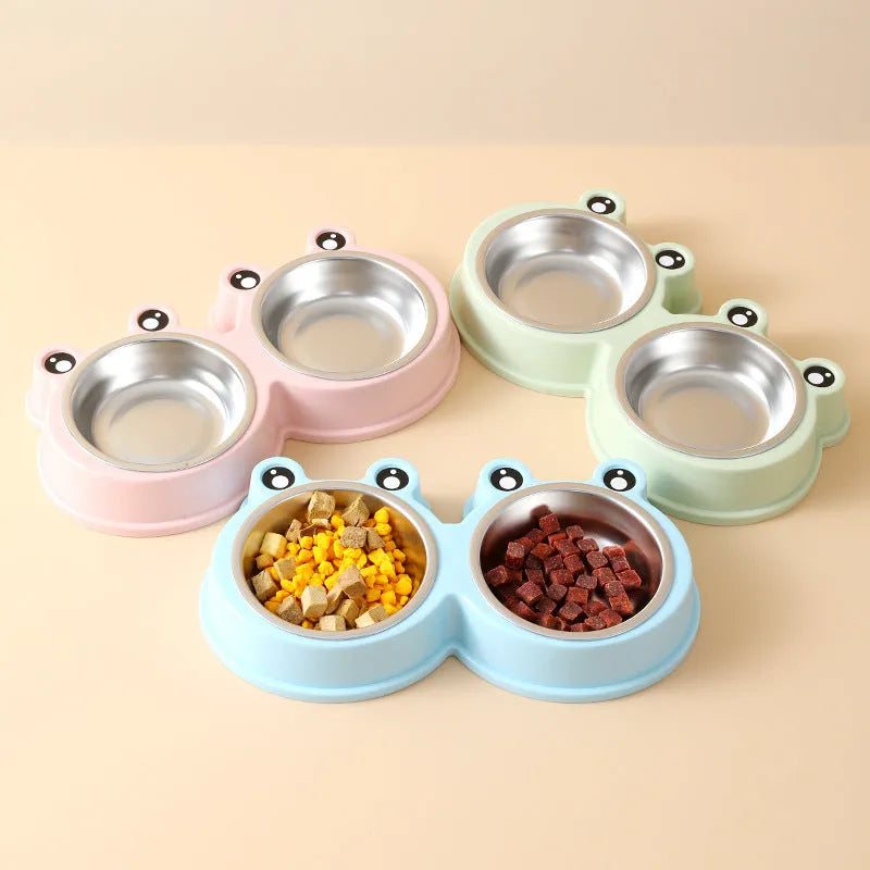 Blue frog-shaped pet double bowl with two stainless steel compartments for food and water