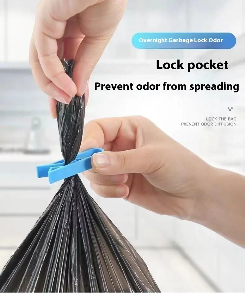 Grey PP plastic non-slip clip for fixing a bin bag to a waste bin rim.