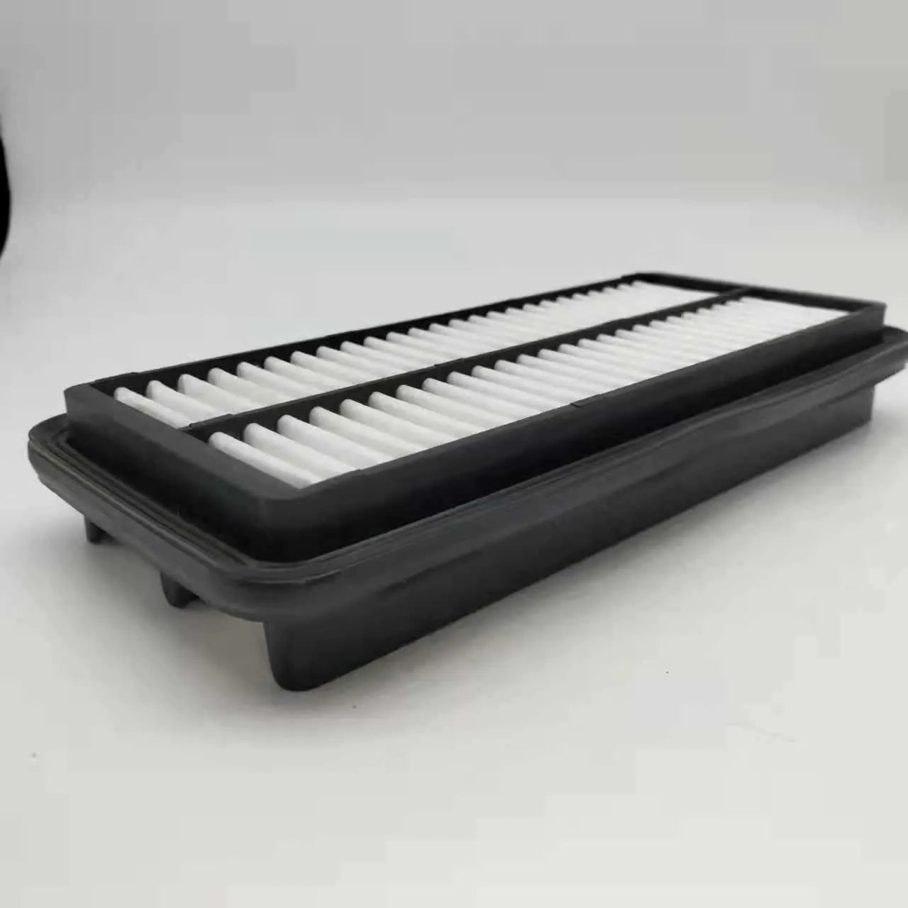 Black rectangular car air filter for Modern vehicles, dimensions 256mm by 113mm by 40mm.