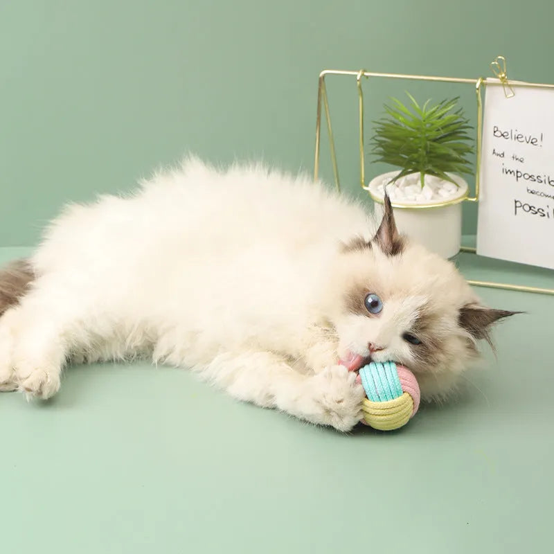 Handmade cat hairball plush toy made from cotton balls in blue powder colour
