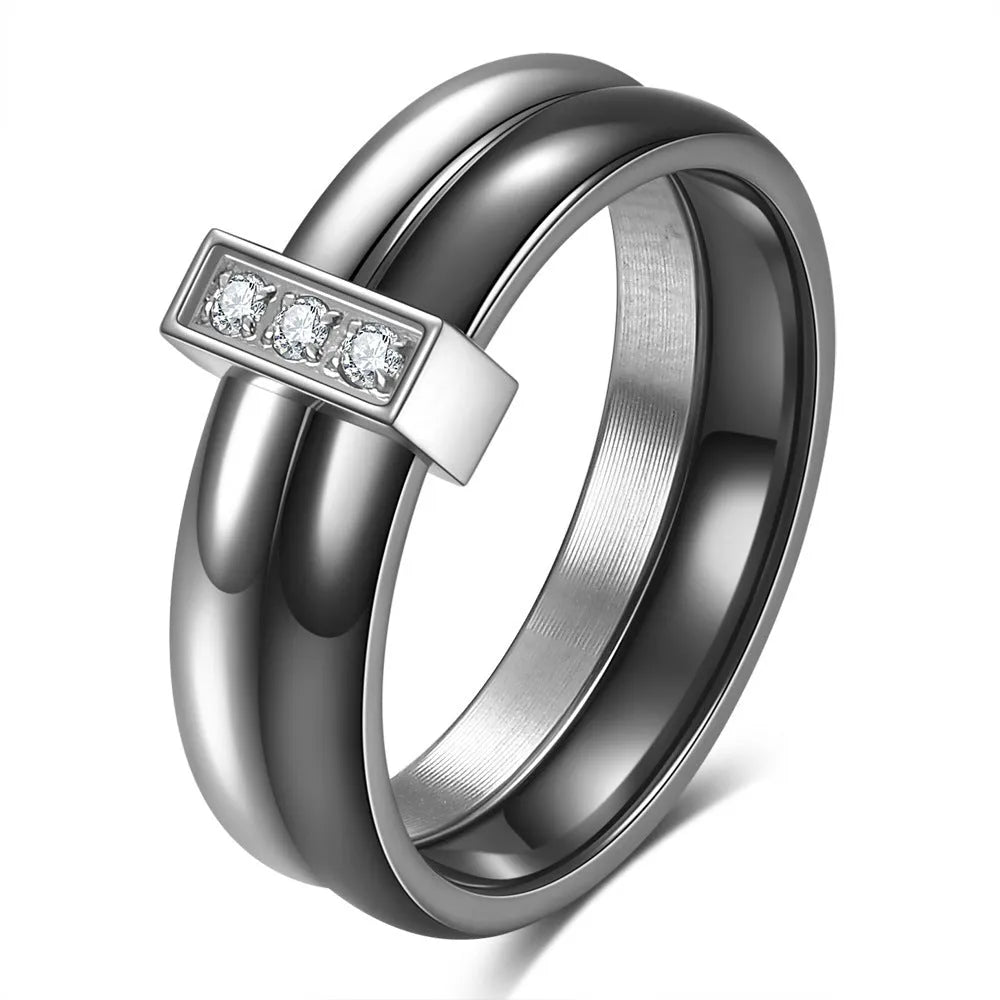 Ceramic geometric women's ring with glossy stitching and zirconium elements in steel black colour