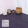 Ten square plastic floor tiles with wood grain finish shown interlocked on a floor.