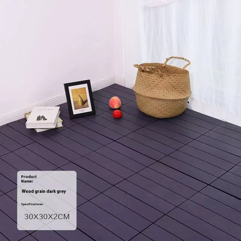 Ten square plastic floor tiles with wood grain finish shown interlocked on a floor.