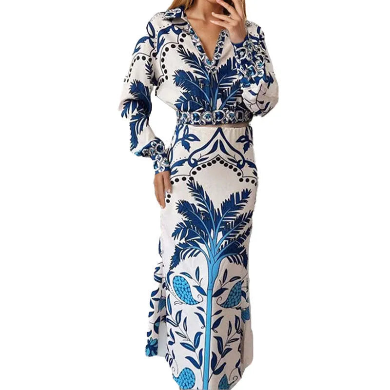 Women's casual floral print two-piece set with long sleeve top and long skirt on a hanger.