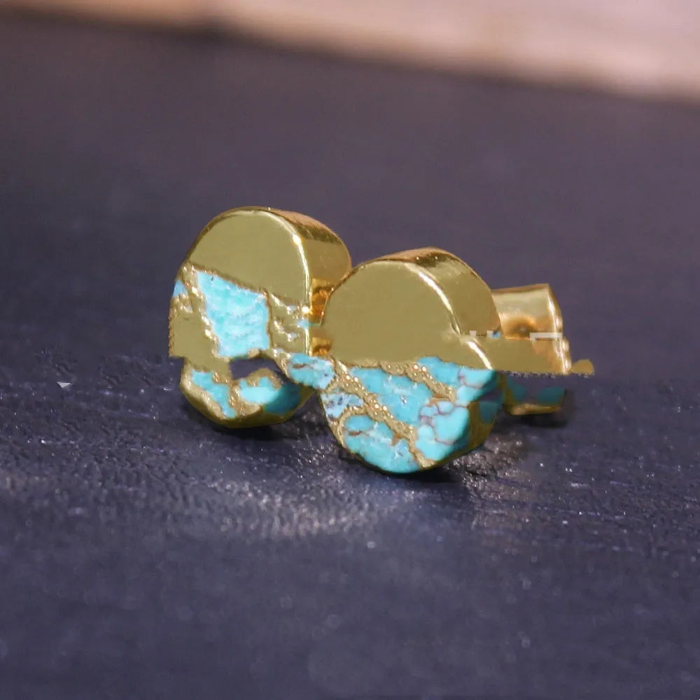 A pair of simple stud earrings with irregularly shaped natural stone beads in colour ER1031.