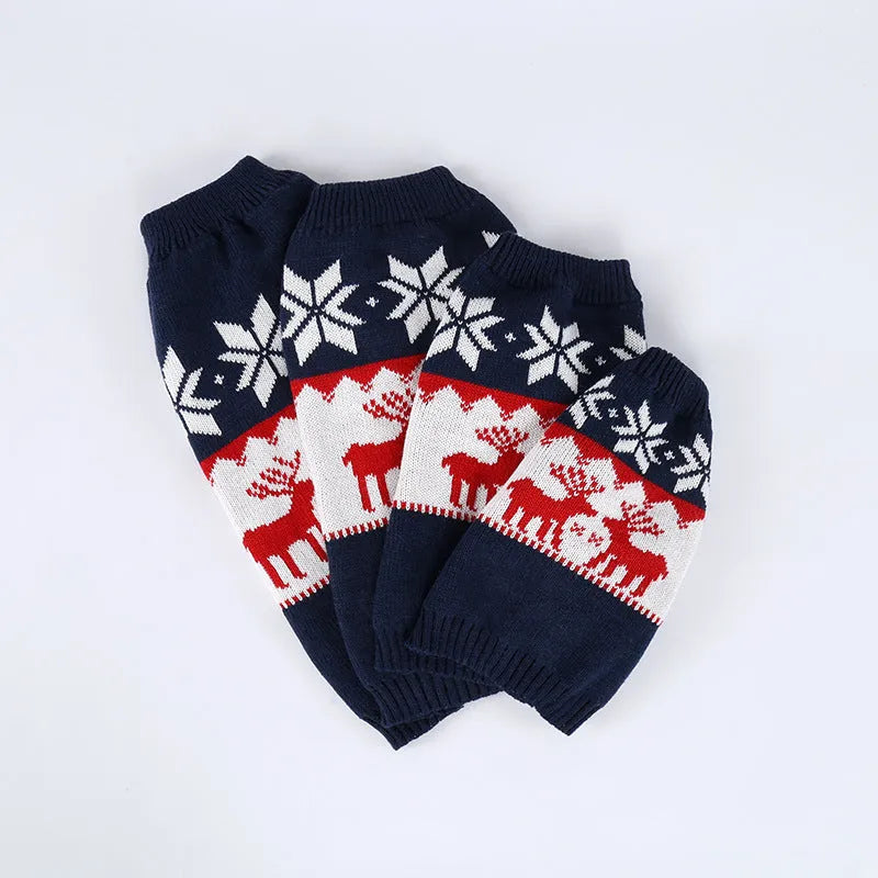 Navy blue knitted dog sweater with Christmas styling on canine model