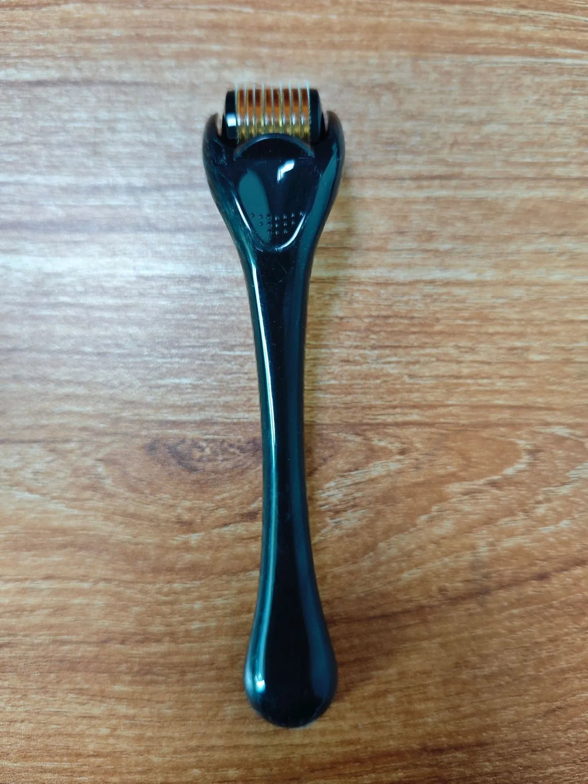 540 needle derma roller micro needling device with black handle and purple roller wheel