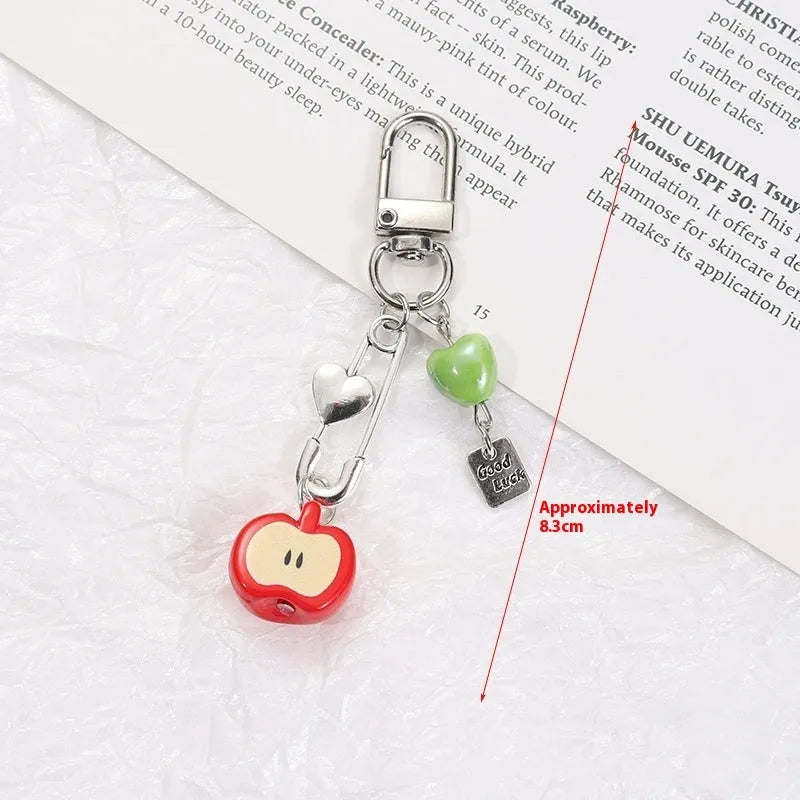 Plastic resin mobile phone keychain with fruit pattern including apple and strawberry designs