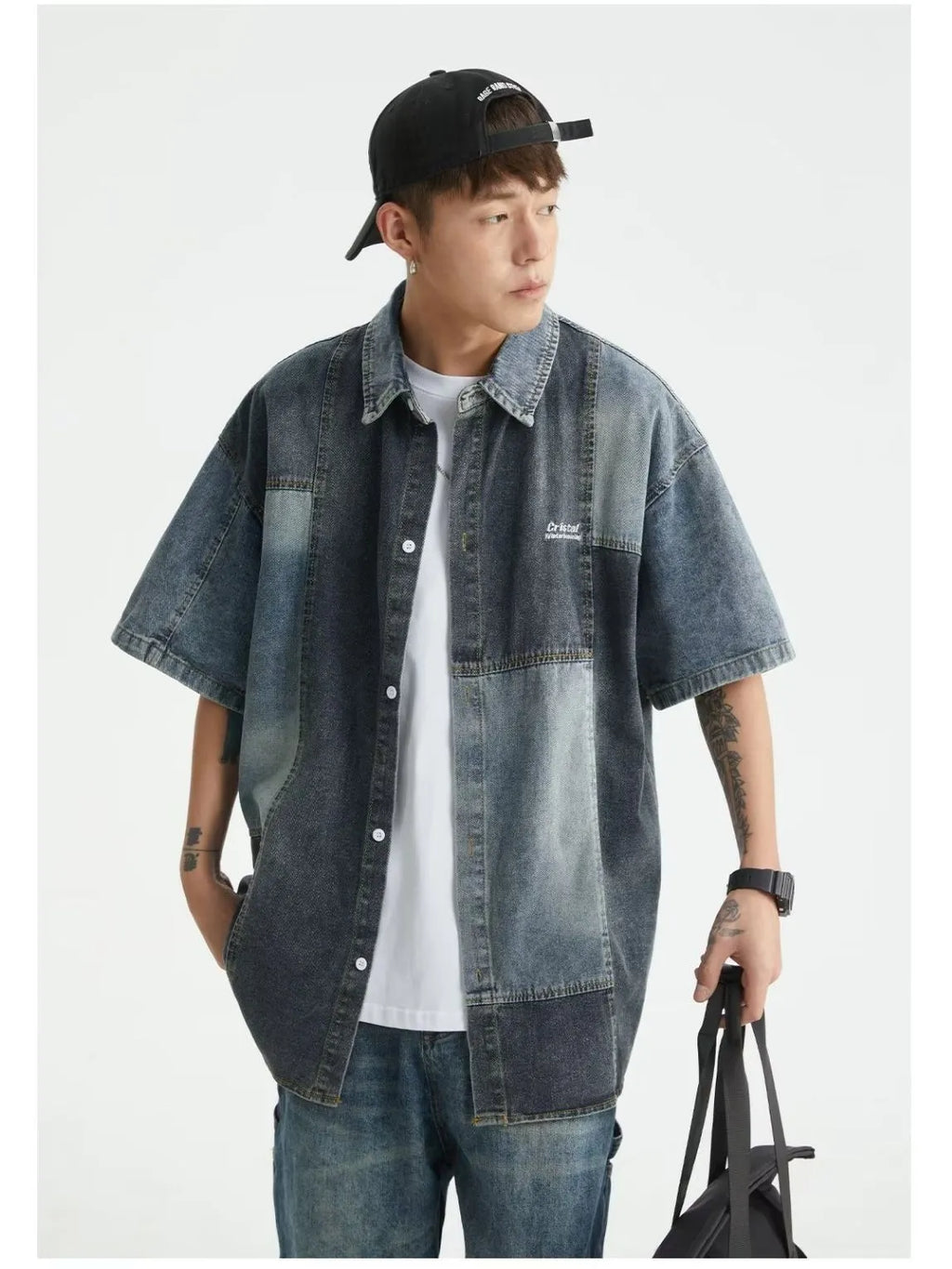 Blue loose-fit men's denim shirt with Japanese retro washed stitching detail.