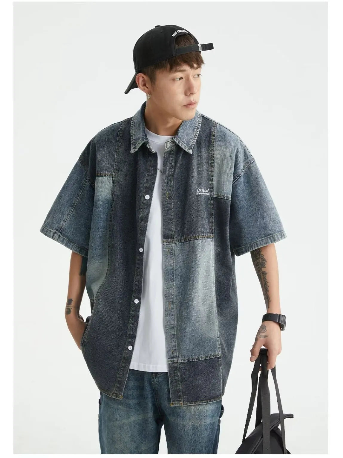 Blue loose-fit men's denim shirt with Japanese retro washed stitching detail.