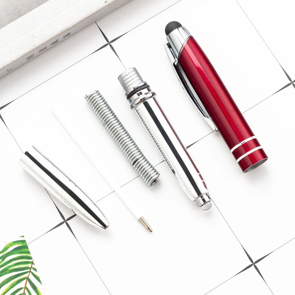 Red metal multifunctional stylus ballpoint pen with LED light and capacitive tip.