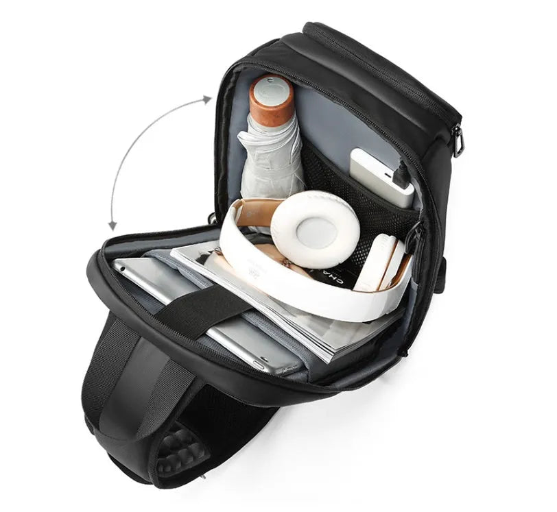 Black medium-sized PVC shoulder bag with zipper, showing internal organiser pockets and an air cushion shoulder strap.