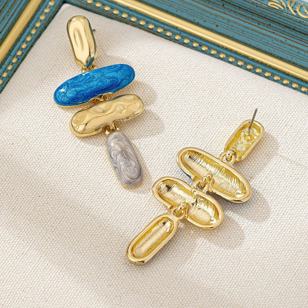 Geometric multicolor stud earrings for women with electroplated finish and simple design.
