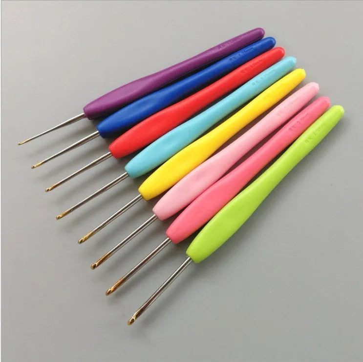 Set of 16 crochet hooks with different sized heads in a PU storage bag