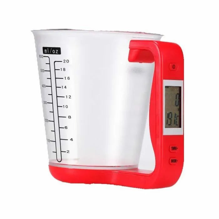 Green electronic digital measuring cup with LCD display on handle showing weight measurement.