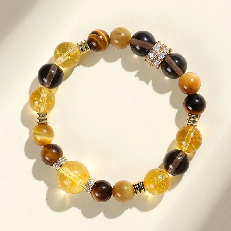 Natural yellow 10mm artificial crystal bead bracelet with tower string design on wrist