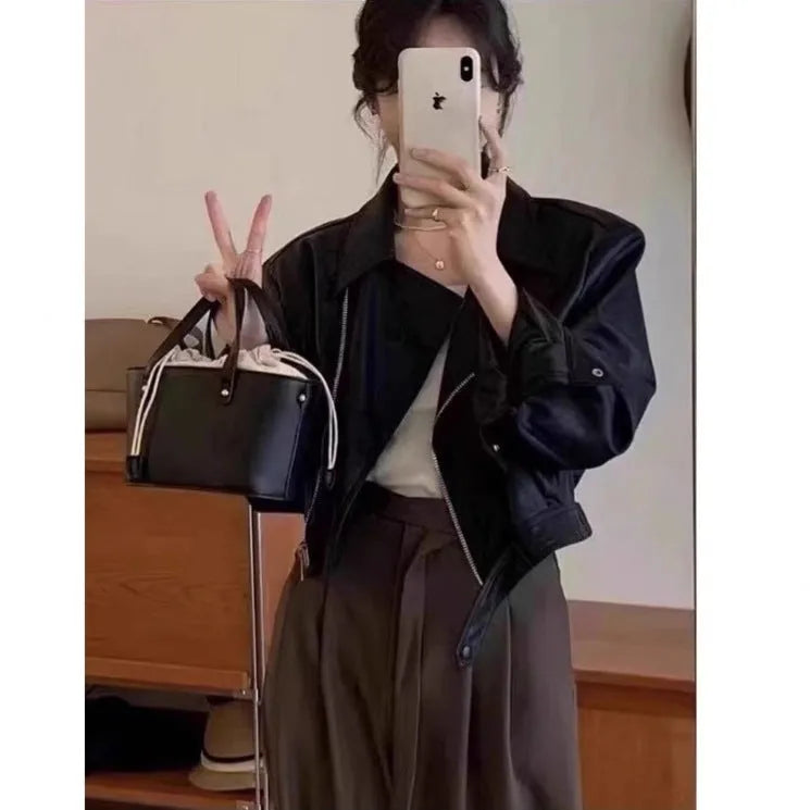 Brown women's retro slim-fit imitation leather coat with a pocket and regular sleeves.