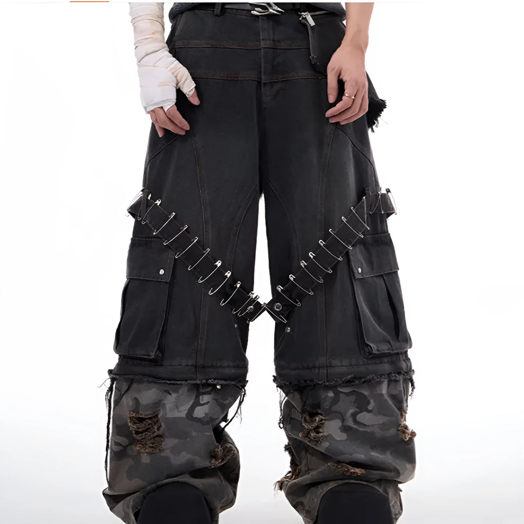 Grey camouflage men's jeans with panel splicing construction and ribbon detailing.
