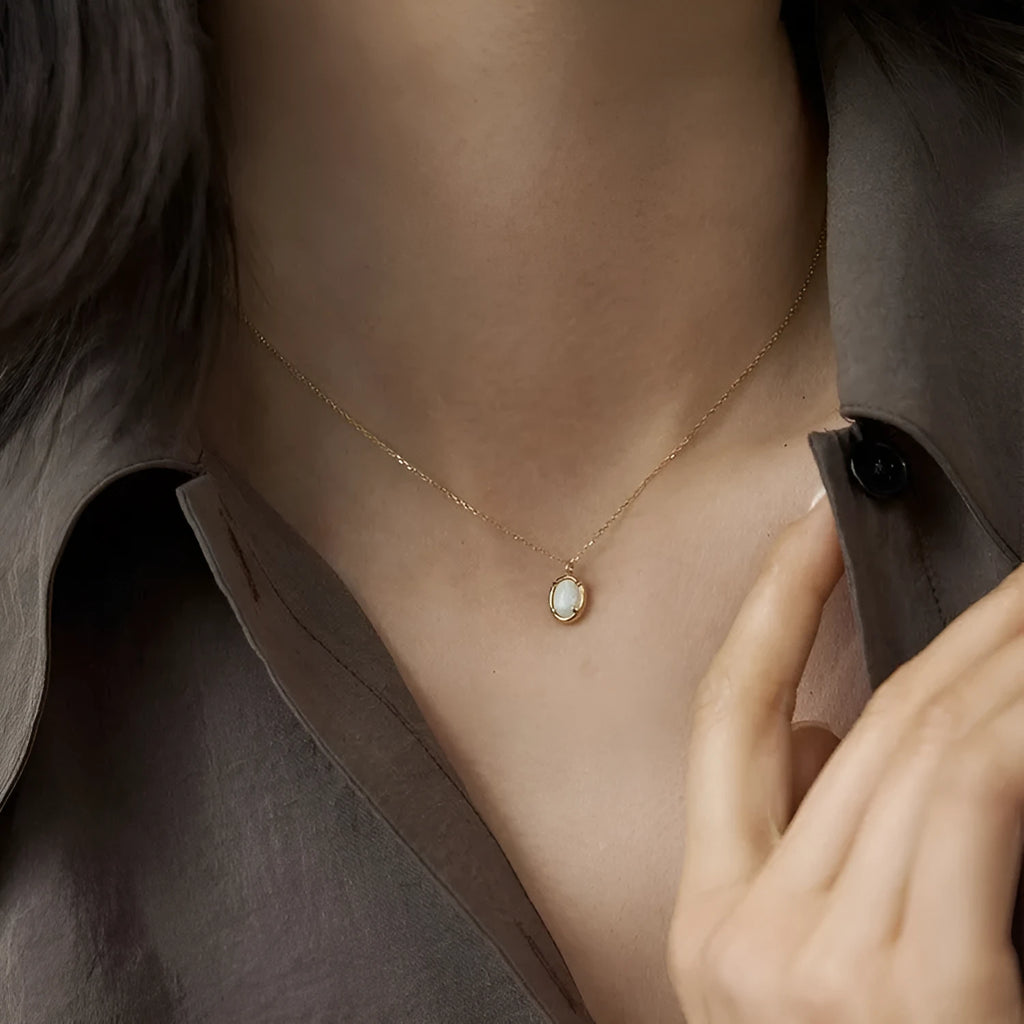 S925 sterling silver geometric pendant with jelly opal, shown in gold and white gold plating options.