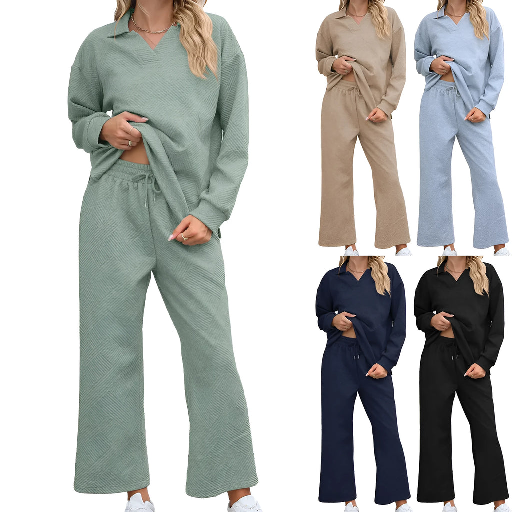 Women's black knitted jacquard lounge suit set with geometric pattern, featuring a long sleeve top and elastic waist cropped trousers.