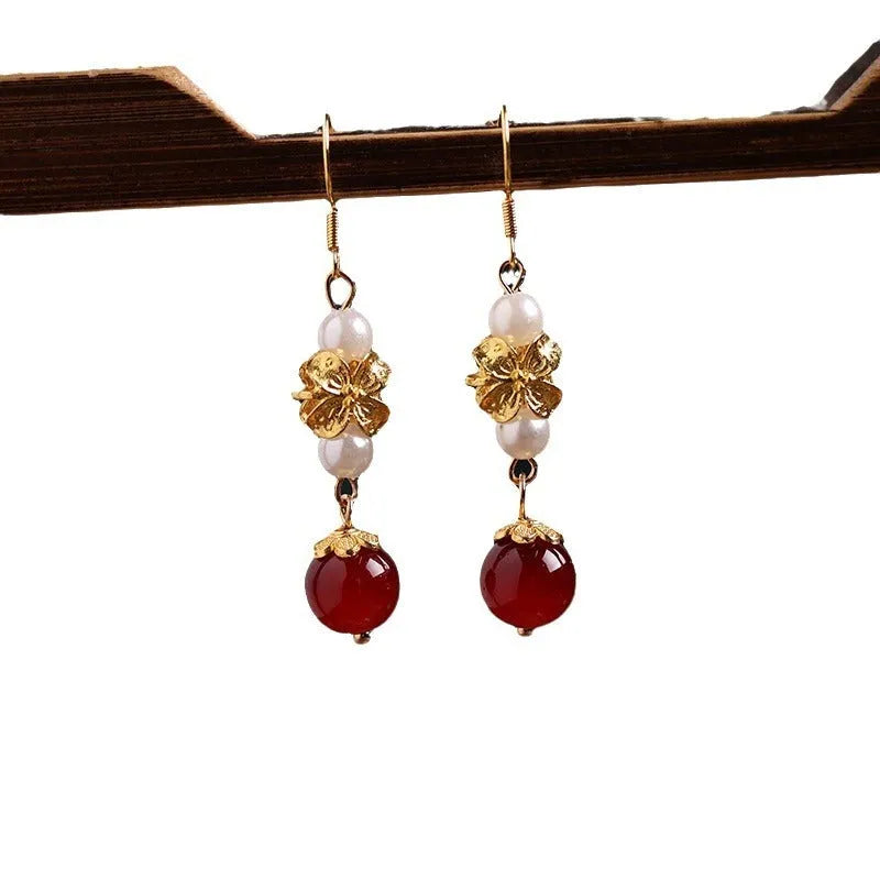 Gold electroplated alloy geometric earrings with vintage Chinese court style design
