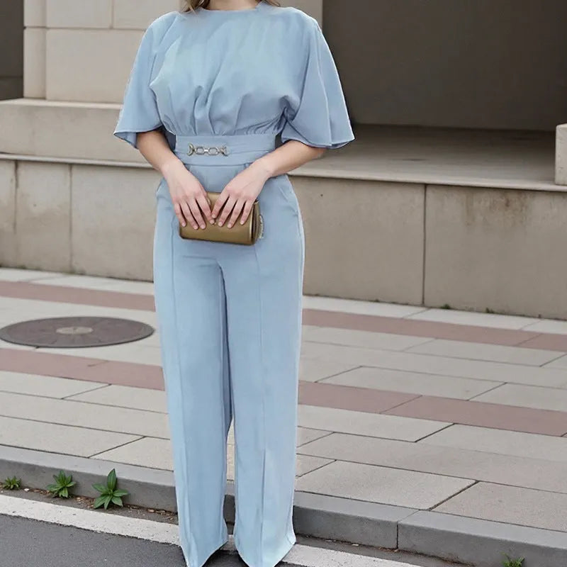 Blue men's polyester business suit with trousers and long-sleeved jacket on a hanger