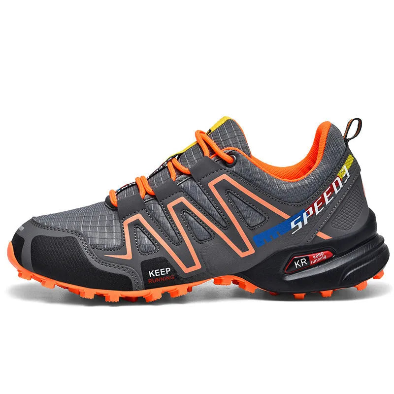 Men's plus size grey orange casual running shoes with low-top design and rubber sole.