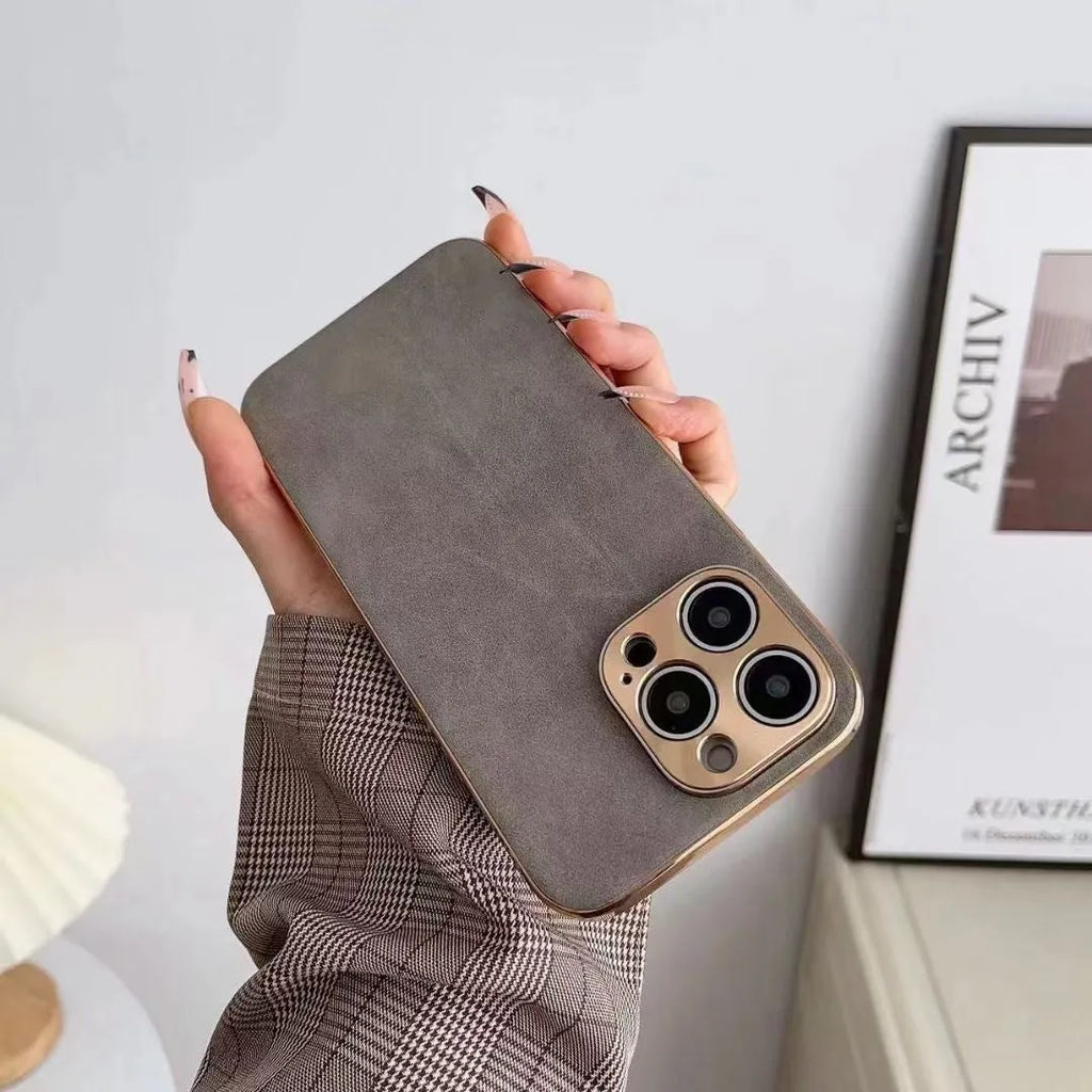 Leather texture TPU phone case for iPhone on a table, shown in grey-green colour.